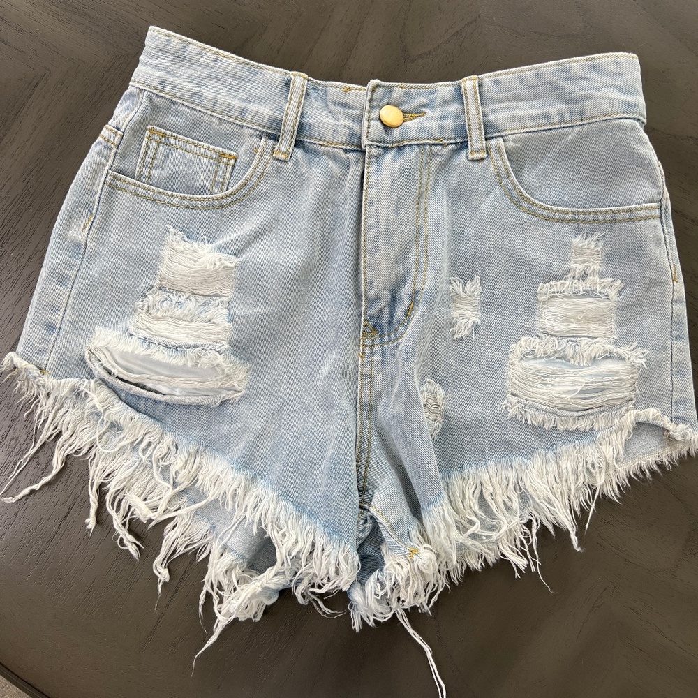 Women’s distressed denim shorts